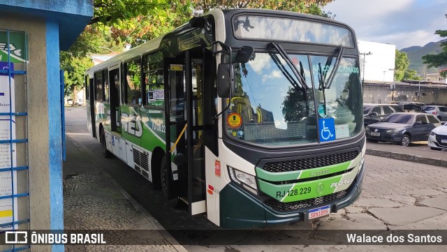 Transportes Flores RJ 128.229 na cidade de Rio de Janeiro, Rio de Janeiro, Brasil, por Walace dos Santos. Número da foto: #12586516.