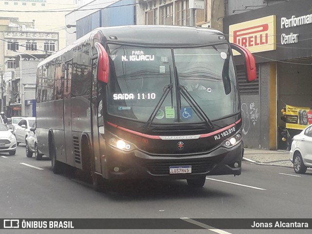 Transportes Única Petrópolis RJ 163.010 na cidade de Duque de Caxias, Rio de Janeiro, Brasil, por Jonas Alcantara. Número da foto: #12659448.