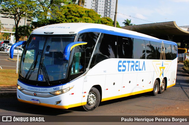 Viação Estrela 1402 na cidade de Uberlândia, Minas Gerais, Brasil, por Paulo Henrique Pereira Borges. ID da foto: 11952394.