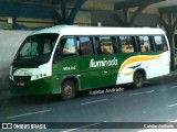 Transporte e Turismo Iluminada MG 2.012 na cidade de Magé, Rio de Janeiro, Brasil, por Calebe Andrade. Número da foto: #12094709.