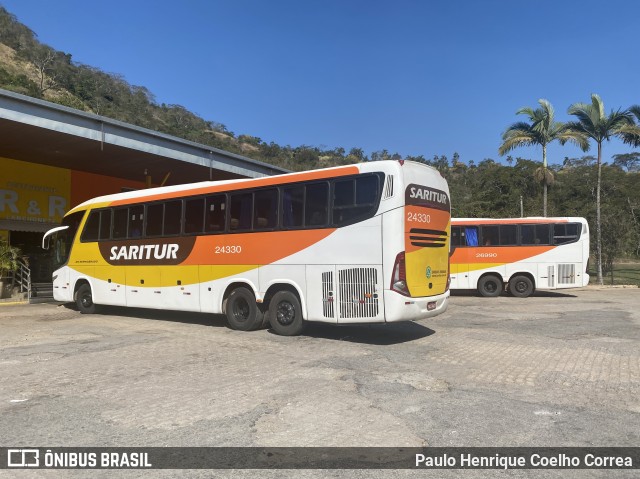 Saritur - Santa Rita Transporte Urbano e Rodoviário 24300 na cidade de Santa Maria de Itabira, Minas Gerais, Brasil, por Paulo Henrique Coelho Correa. Número da foto: #12349701.